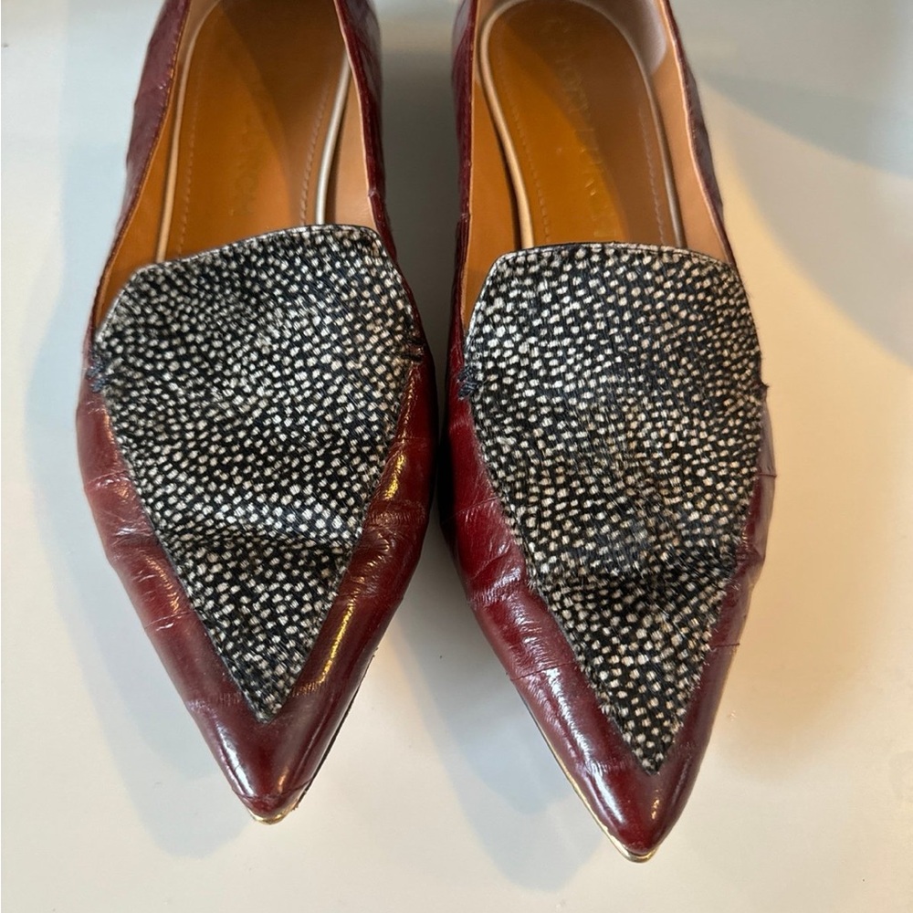 Tory Burch eel skin burgundy flats with gold top and calf hair top.  10.5.